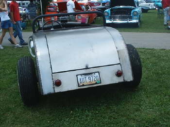 Check it out!  Not a real '33 Ford roadster, but a handbuilt sheet-metal hommage, complete with pie cuts & tackwelds.