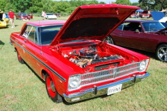 1  Roger Payne is a member of the Bastrop Cruisers and shows of his '65 Plymouth with a 383 and 4 speed