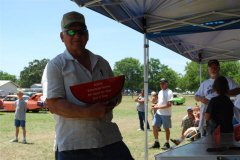 74  Billy Willenburg shows off the Best In Show trophy he won with his super nice '55 Chevy