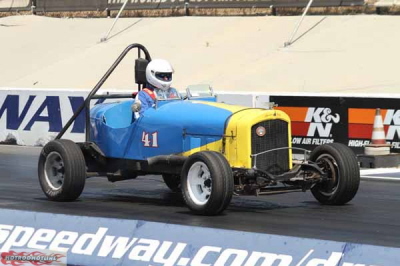 The Thatcher Darwin Darwin Beetle car on the track.