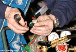 The jeweler’s torch can be connected to the standard oxygen acetylene tanks.