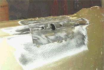 This fit is nice & clean, tack welded in place mirror patch, with brace still attached which has been welded to the inner door structure.