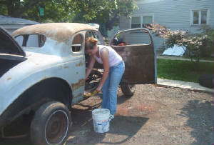 Becky gutting the car