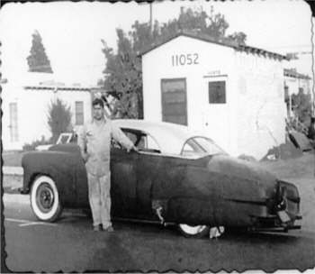 Sam Barris in front of the shop!