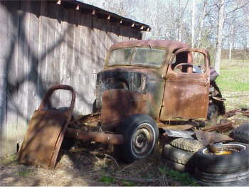 Truck 2 - This poor slob will transform itself into a roadster pickup with rat rod potential. Maybe even scare kids & little old ladies!