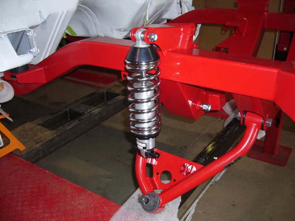 Coilovers are utilized fo rlight weight, adjustablility, and performance. Mounting is done with the T-Bar style.