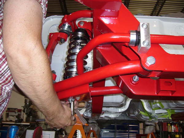 Shocks are secured to the lower control arm.