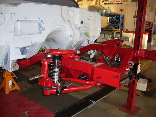 The rod ends are installed and connected to the spinddles. Sway bar is bolted into place.